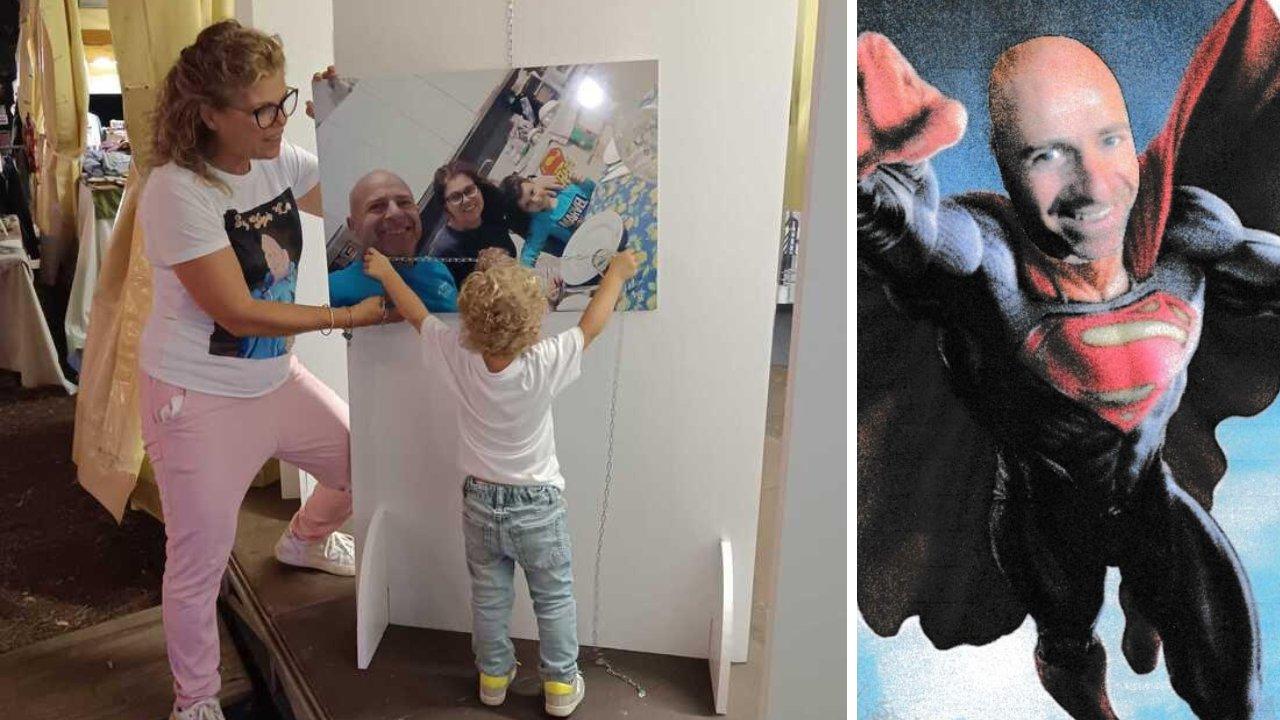 L’immagine della onlus “Superpapà Luca” con il volto di Giannecchini; la figlia che abbraccia una sua foto