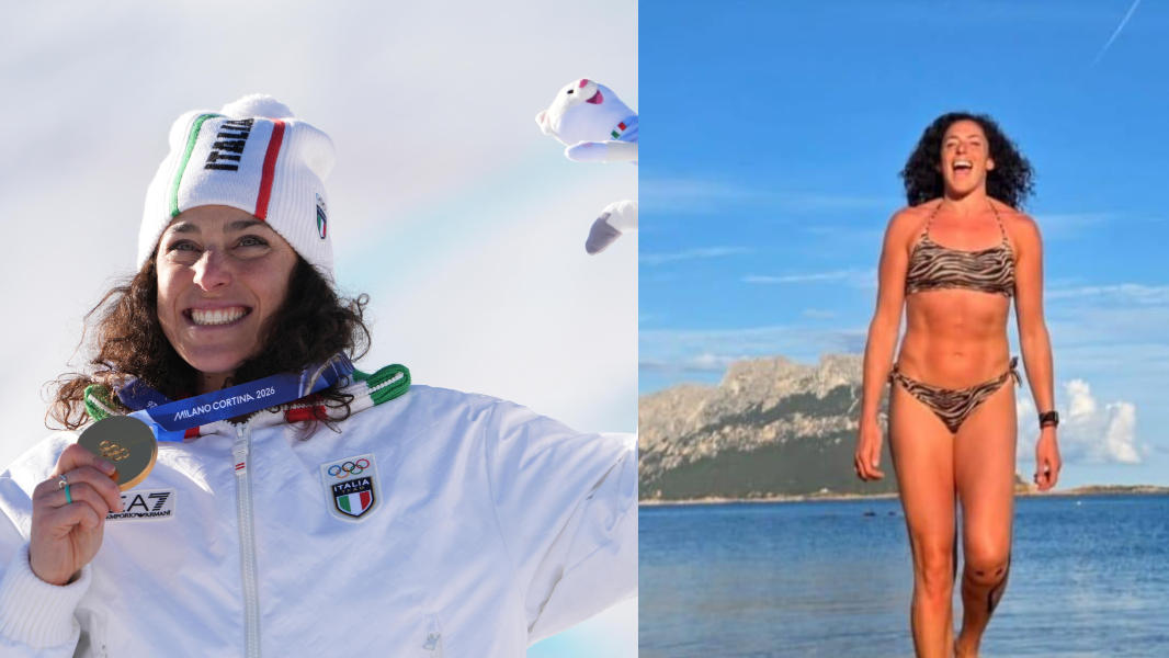 
	Federica Brignone con la medaglia d'oro nel SuperG e in vacanza in Sardegna, alle sue spalle l'isola di Tavolara

