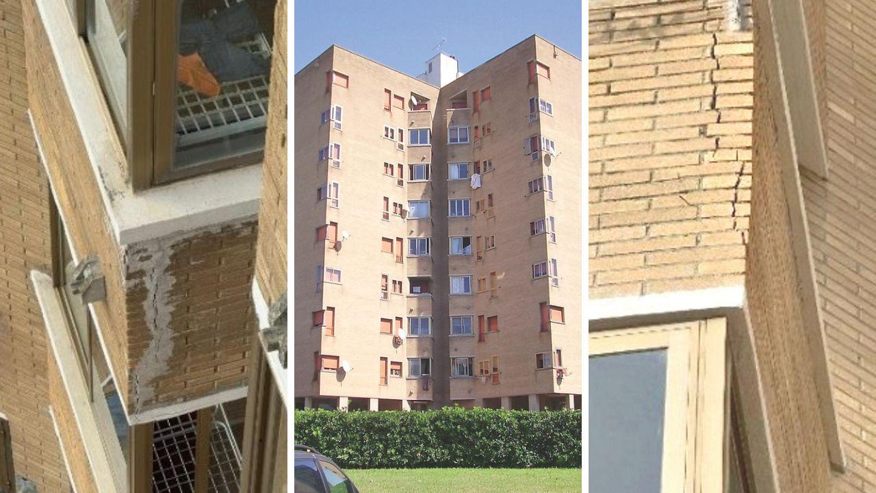 Il palazzo delle case popolari di via Amendola e alcune delle crepe sulla facciata