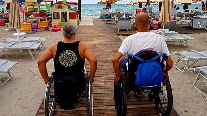 Nella foto, a destra Alfio Uda presidente di SardegnaAccessibile Odv