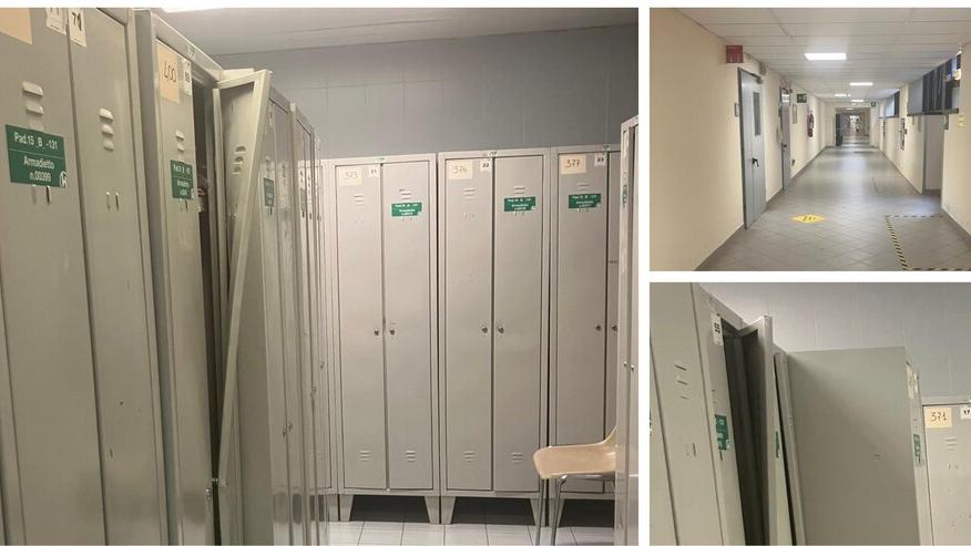 Alcuni degli armadietti forzati negli spogliatoi delle dipendenti della Piastra e il corridoio di accesso all’area spogliatoi