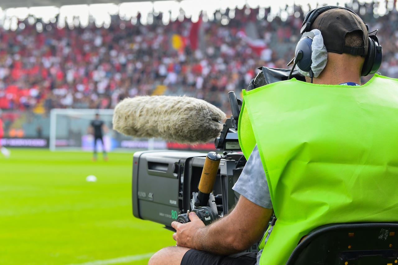 
	Un cameraman allo stadio

