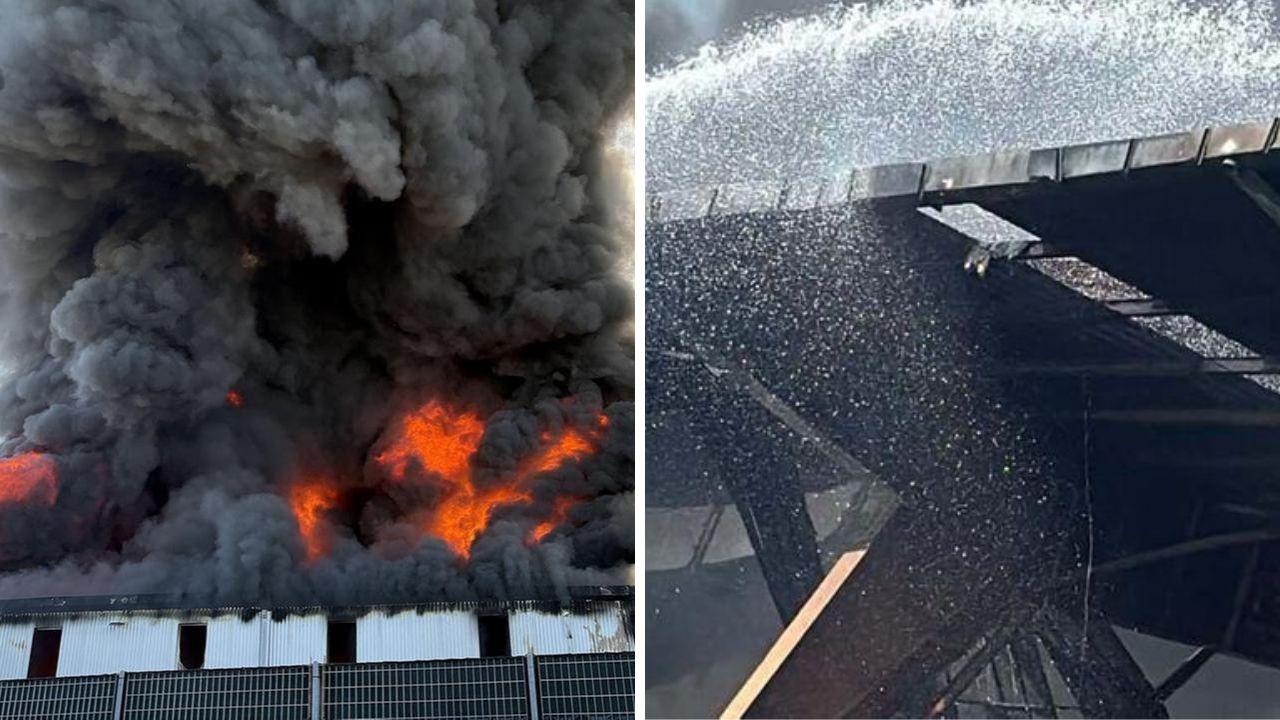 Le fiamme e l'intervento sul capannone (foto Stick)