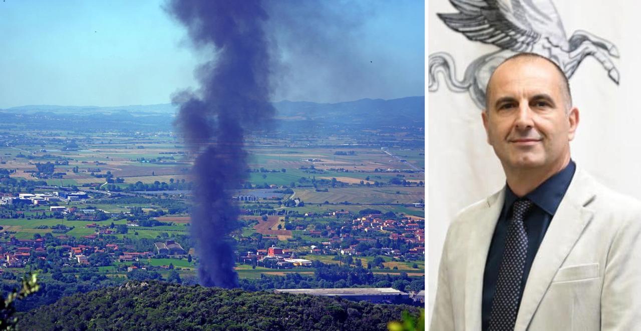 
	La colonna di fumo dell'incendio e di fianco l'assessore Barontini

