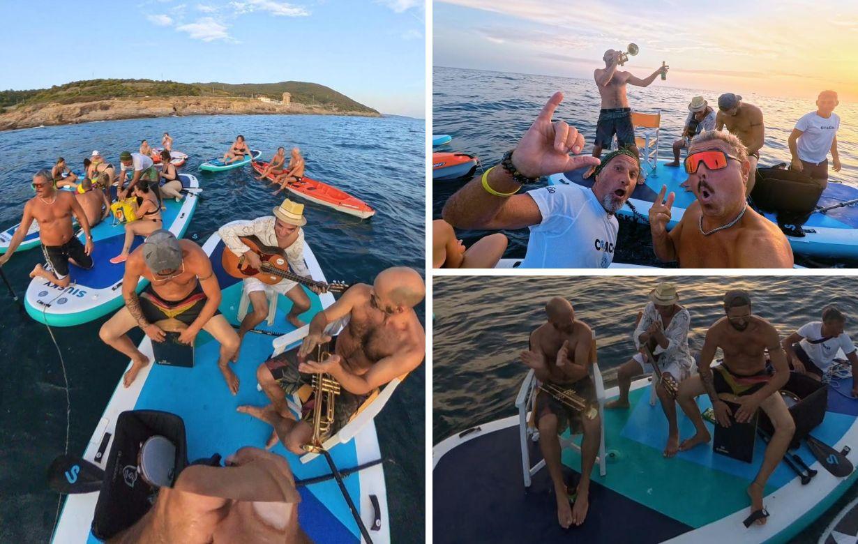 A Livorno il sup diventa palco: all’ora del tramonto il concerto è in mezzo al mare