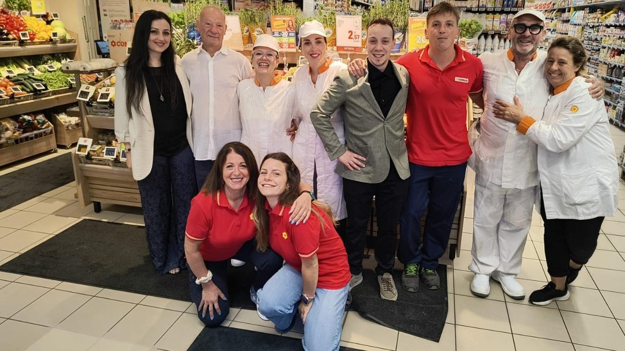 
	Staff e dipendenti del Conad City di Borgo San Jacopo

