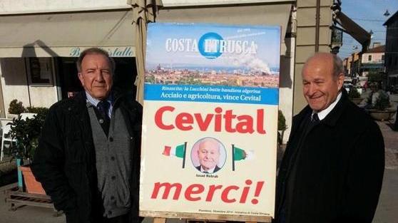 Issad Rebrab (a destra) e il suo consulente Farid Tidjiani accanto a un cartello di benvenuto