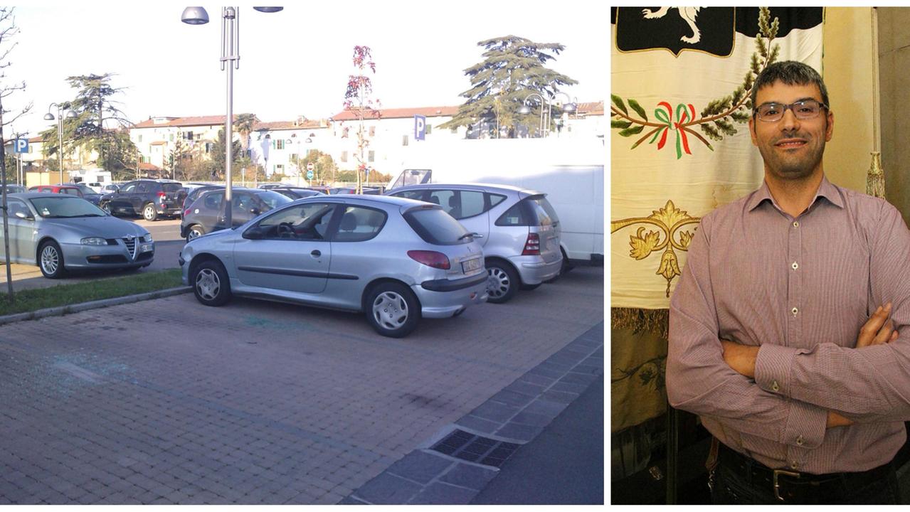 Un’auto danneggiata nel parcheggio di piazza D’Acquisto e l’assessore Alessio Sabatini