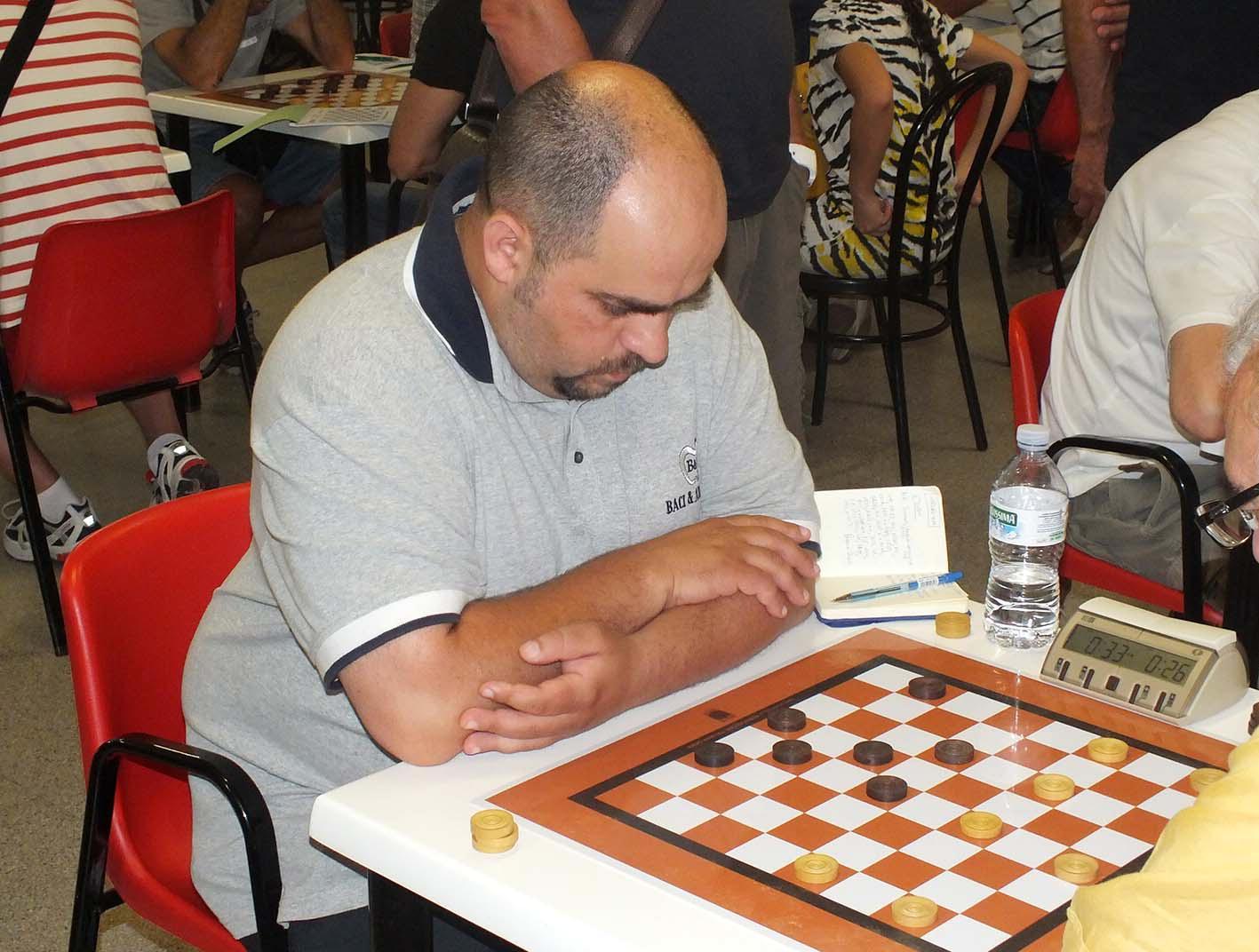 Michele Borghetti, il campione mondiale di dama
