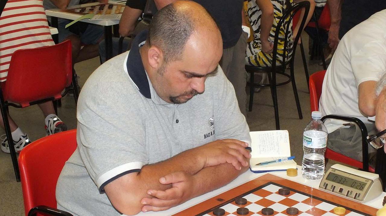 Michele Borghetti, il campione mondiale di dama