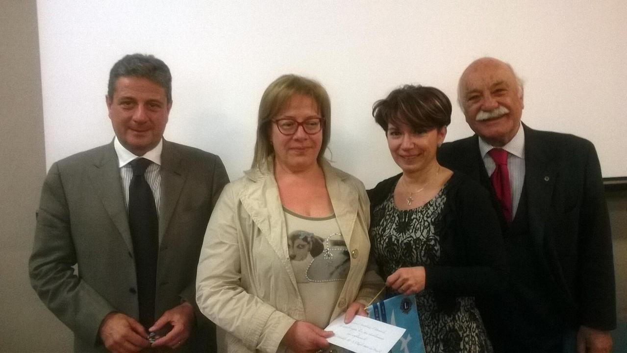 Il viceprefetto Manzo, la dottoressa Luschi, la dottoressa Doretti e il presidente del Lions Club di Orbetello, Piazzoli