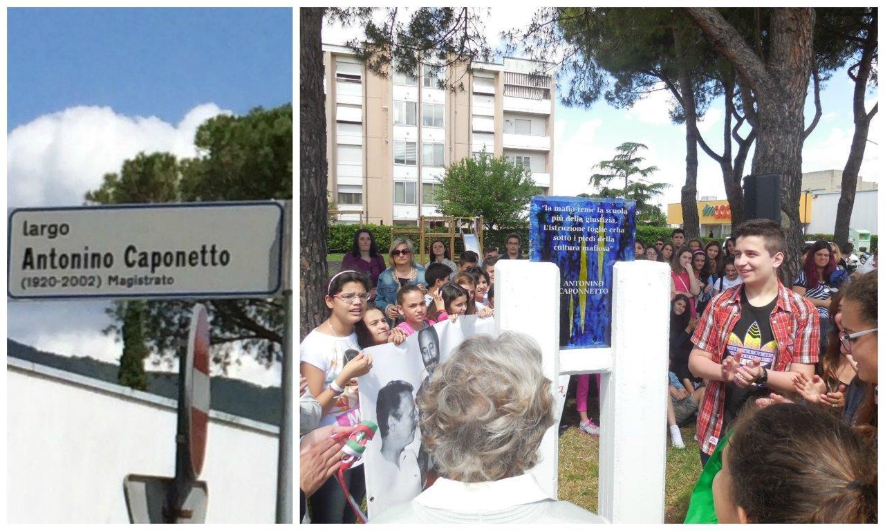 Il cartello con il nome del magistrato storpiato e un momento della cerimonia
