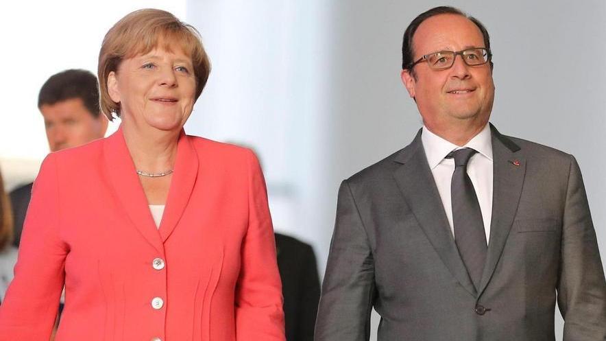 Parigi e Berlino unite «Quote obbligatorie» Sanzioni a chi rifiuta