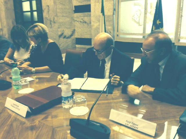 Issad Rebrab, al centro tra il ministro Federica Guidi e l'ad di Aferpi, Farid Tidjani