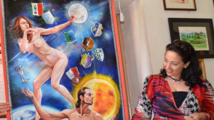 Un uomo, una donna e la clessidra nel drappo realizzato dall’artista Taddei