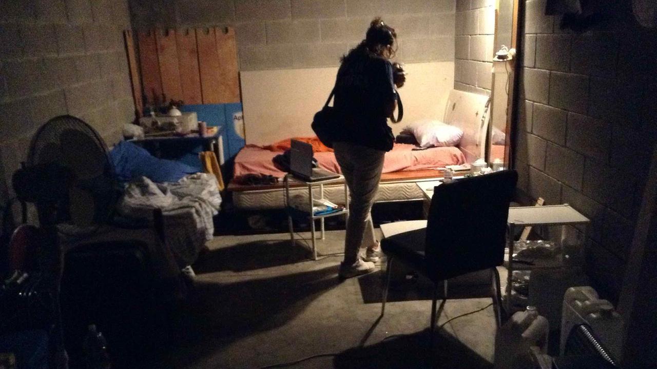 Uno dei garage occupati dai cinesi in via Respighi (archivio)