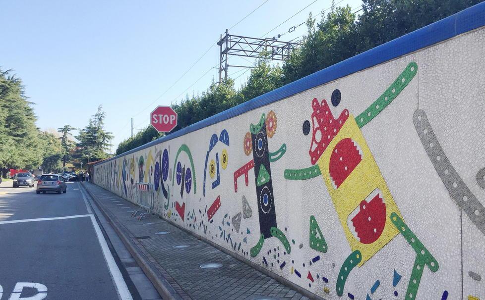 Torna a nuova vita il muro di Enrico Baj 