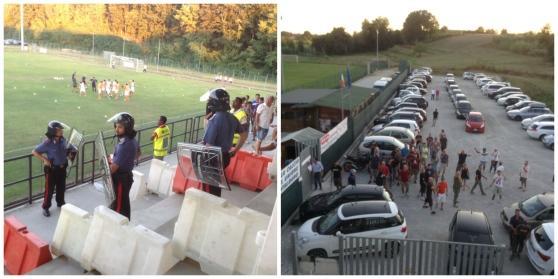 Le forze dell'ordine in tenuta antisommossa e i tifosi davanti allo stadio Cei