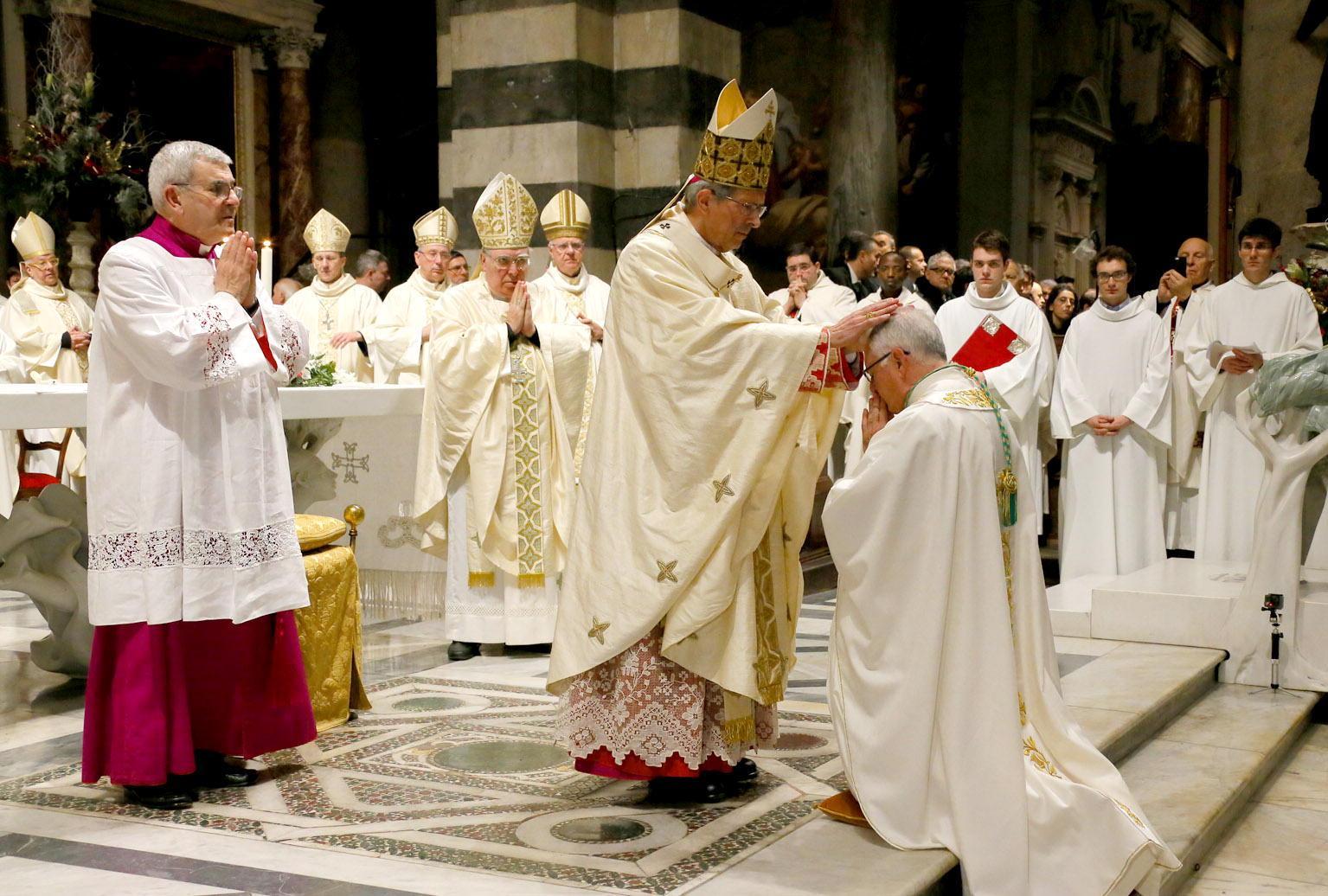 Un momento della cerimonia in Duomo (Muzzi)