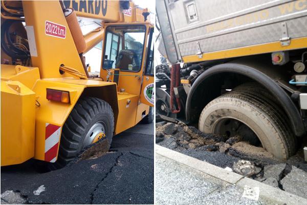 I due mezzi "inghiottiti" dall'asfalto (foto Paglianti / Ciurca)