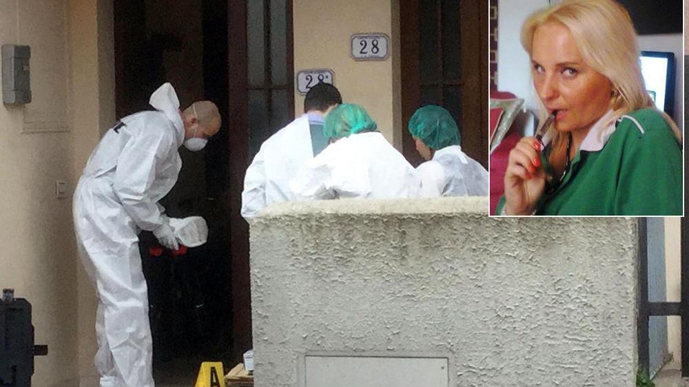 L'abitazione e una foto della donna