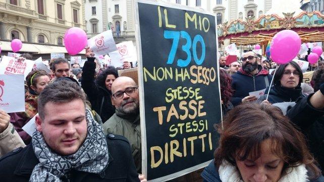 Uno dei cartelli alla manifestazione di Firenze