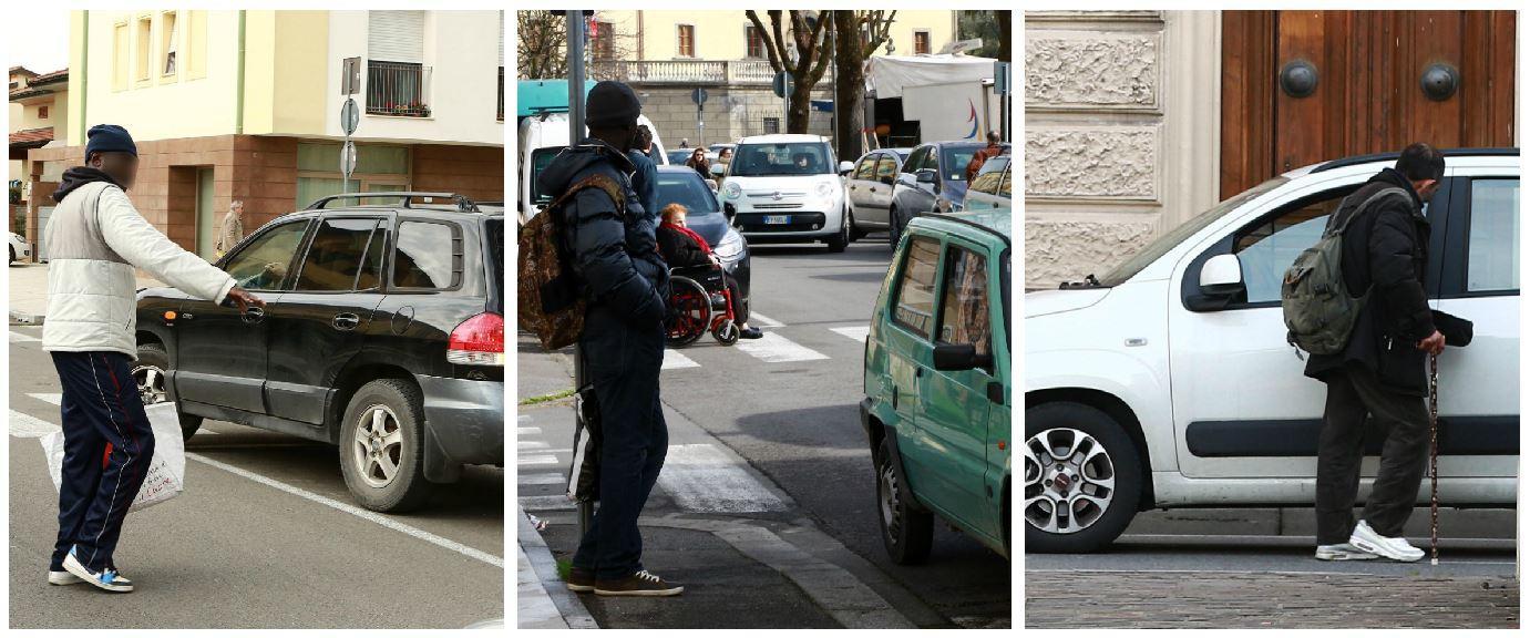 Posteggiatori e mendicanti nella zona intorno al mercato del mercoledì (Foto Agenzia Carlo Sestini)