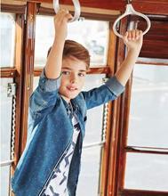 Andrea Arru in uno degli scatti per la collezione Armani Junior