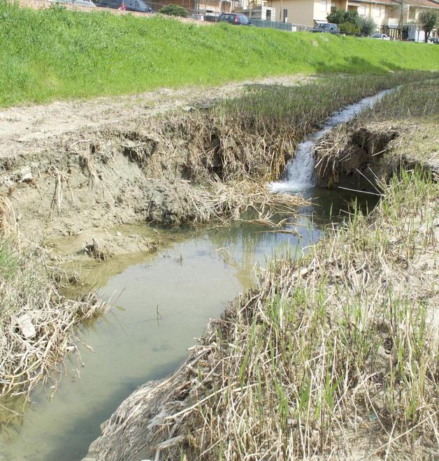 Buca nel letto del torrente Agliena 