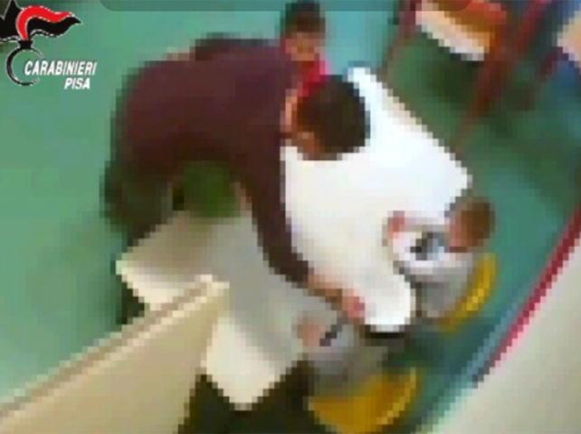 Un fermo immagine di uno dei video girati dai carabinieri nell'asilo