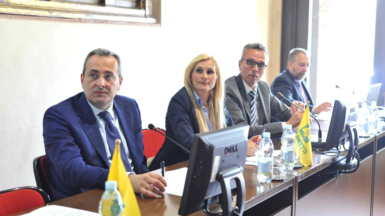 Da sinistra Simone Ciampoli (direttore Coldiretti), Michela Nieri (presidente Coldiretti), il vivaista Marco Romiti e Michele Bellandi (foto Lorenzo Gori)