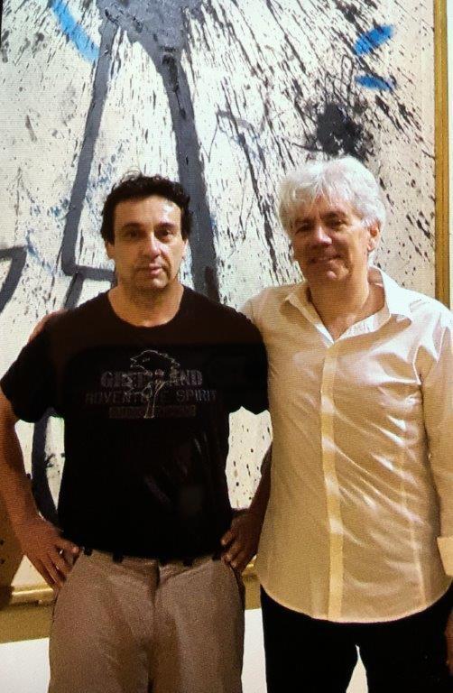 Il visitatore premiato Giacomo Dolfi con l'assessore Bruno Ialuna