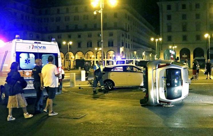 La Lancia adagiata su un fianco dopo l'impatto (Marzi Pentafoto)