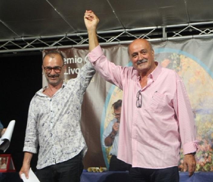 L'assessore Francesco Belais proclama Marco Dolfi vincitore del Premio Rotonda (Salvini Pentafoto)