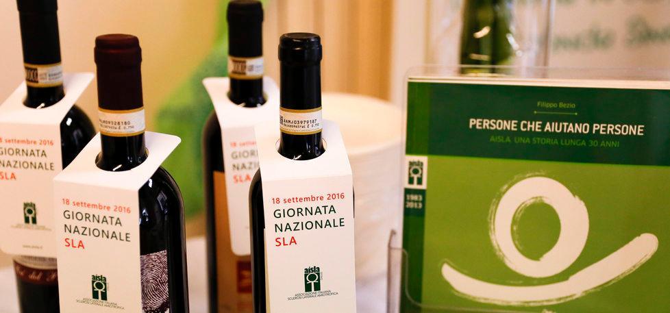 Una bottiglia di vino per sostenere Aisla