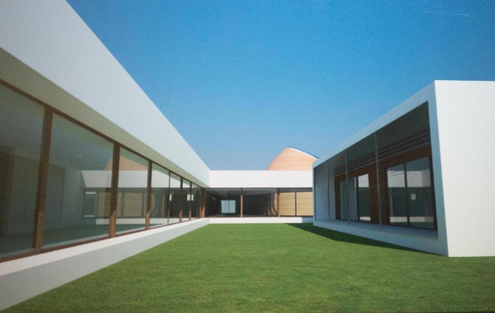 Il rendering dello spazio verde esterno della futura scuola