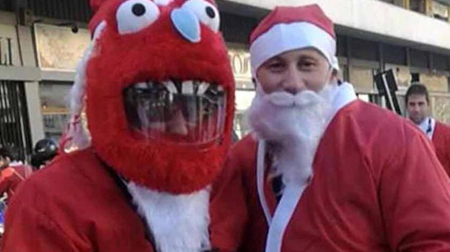 Babbo Natale sale in moto