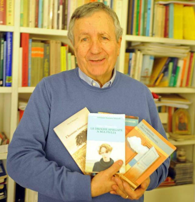 Henri Margaron con alcuni dei suoi libri (Foto Paolo Barlettani)