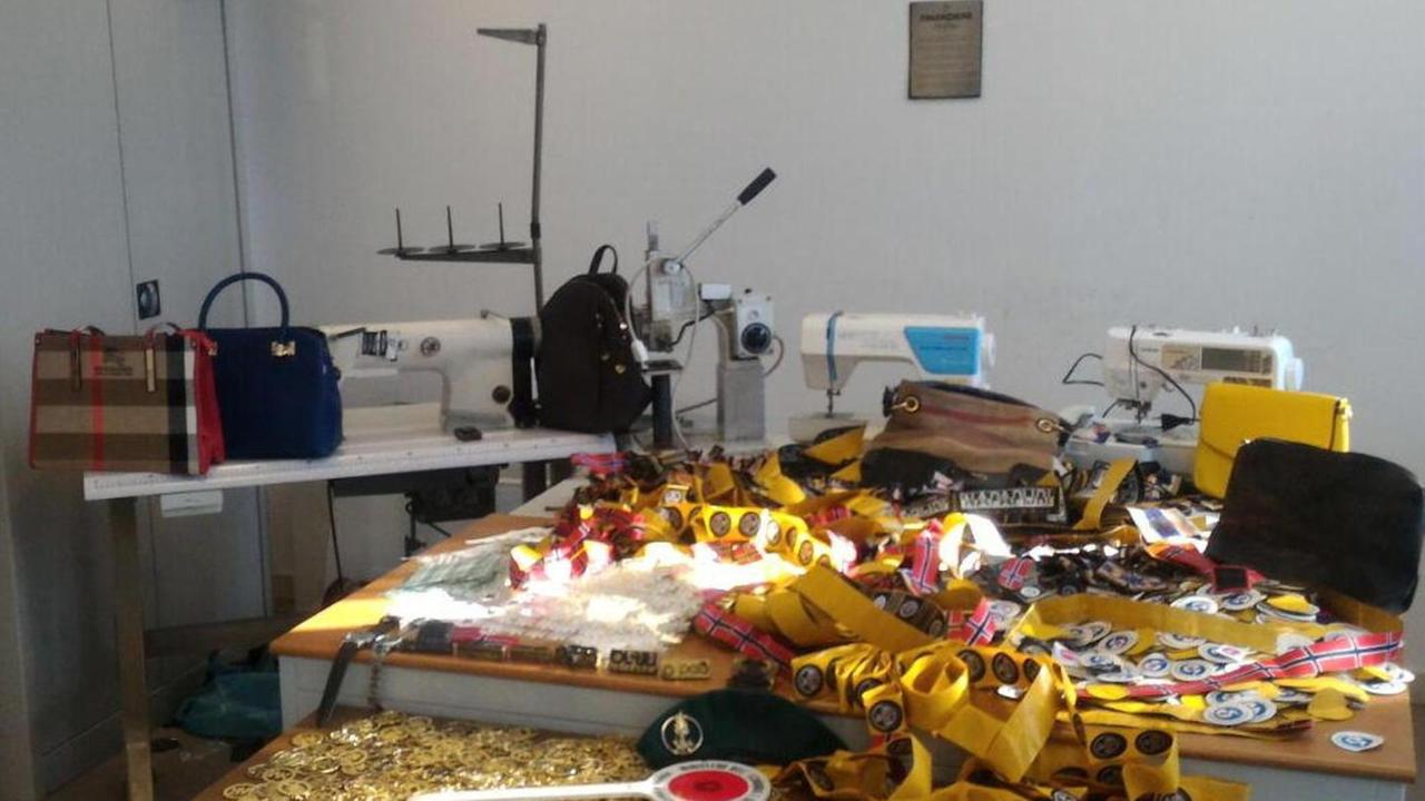 Blitz nel deposito dei falsi marchi