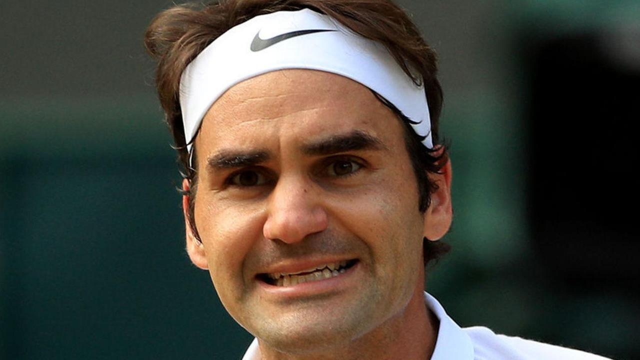 E Federer regala una sua racchetta a Kaukenas