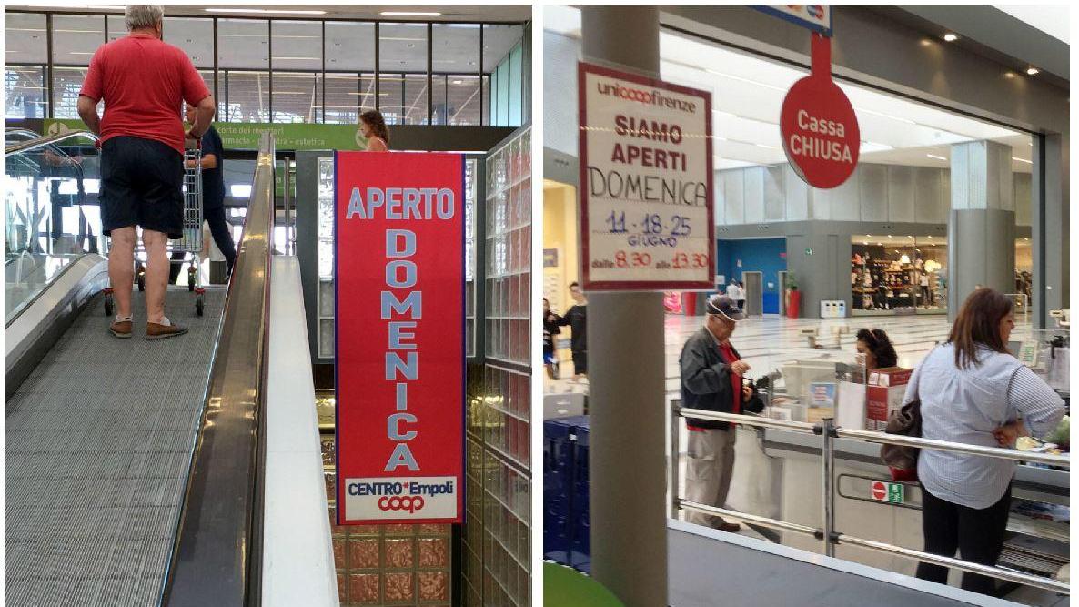 I cartelli che annunciano l'apertura domenicale dei negozi e la chiusura pomeridiana del supermercato (Foto Agenzia Carlo Sestini)