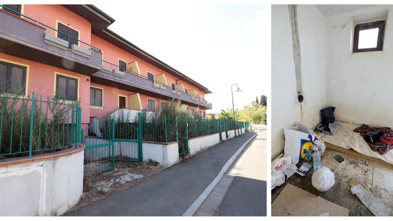 Il complesso residenzia occupato e i segni di vita in uno dei garage (Foto agenzia C. Sestini)