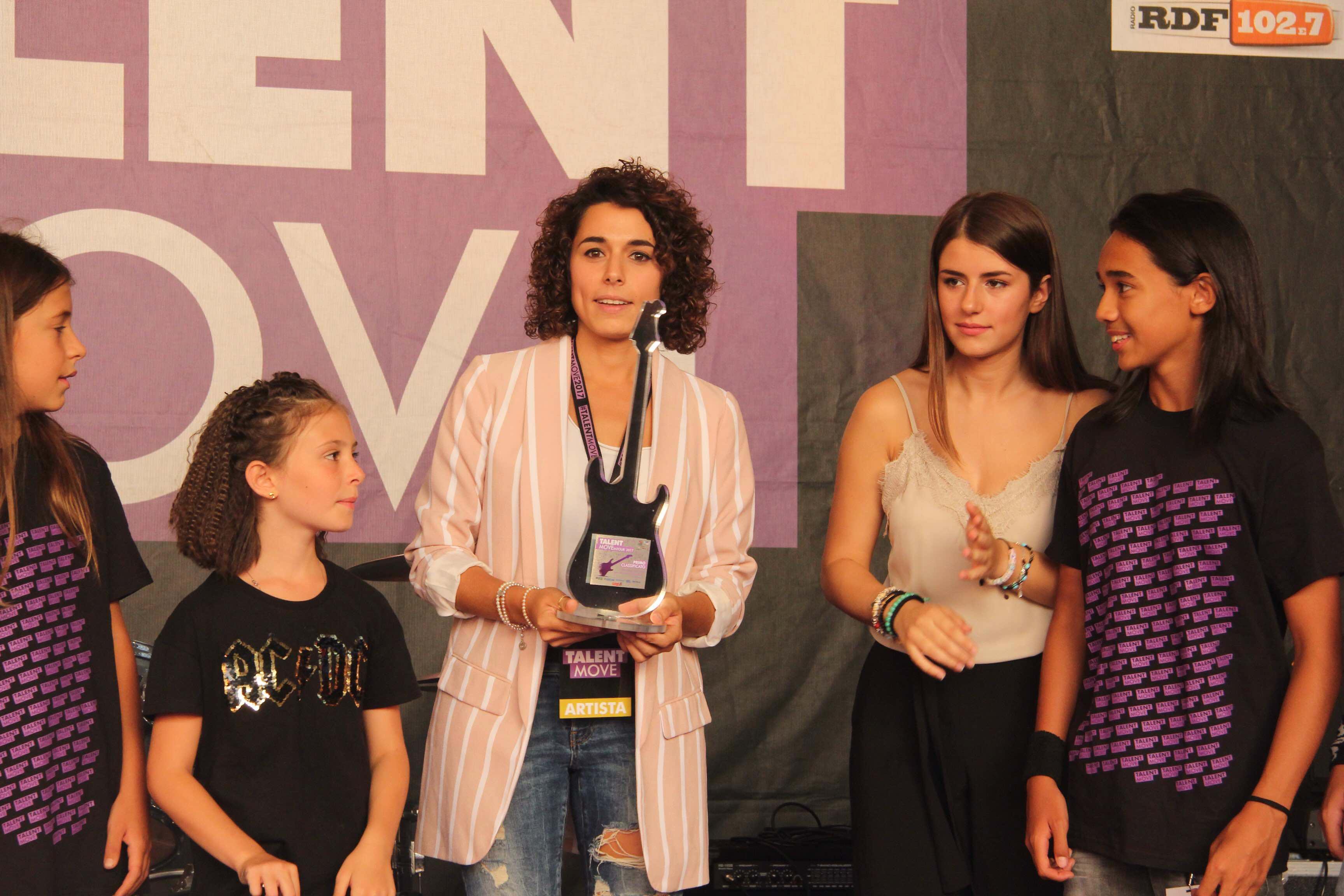 Al centro Eleonora Tirrito vincitrice del "Talento Move 2017" (foto Batavia)