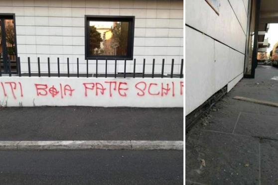 I danni alla facciata dell'albergo e le scritte (foto iltirreno.gelocal.it)