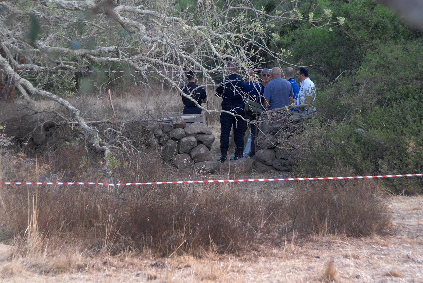 Inquirenti sul luogo del delitto