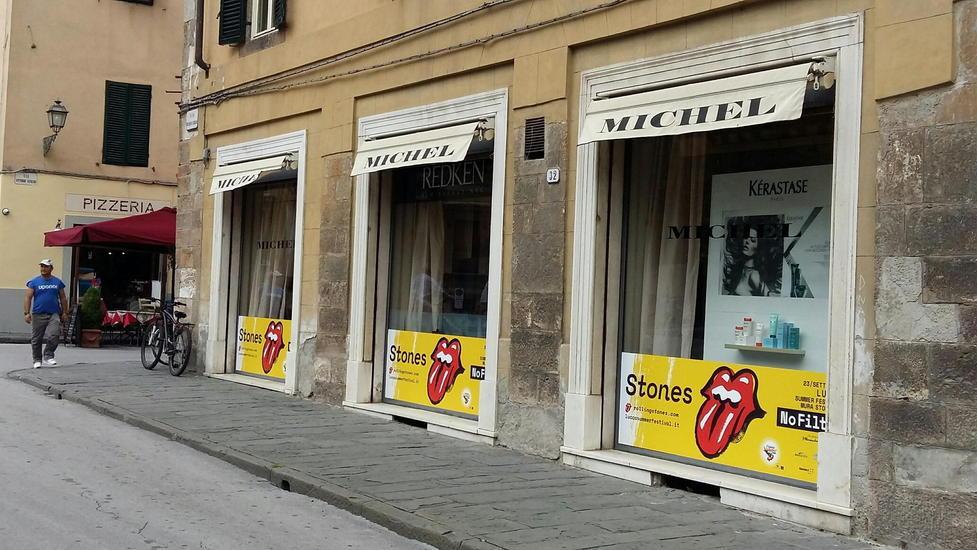Adesivi gratis per i vetri dei negozi