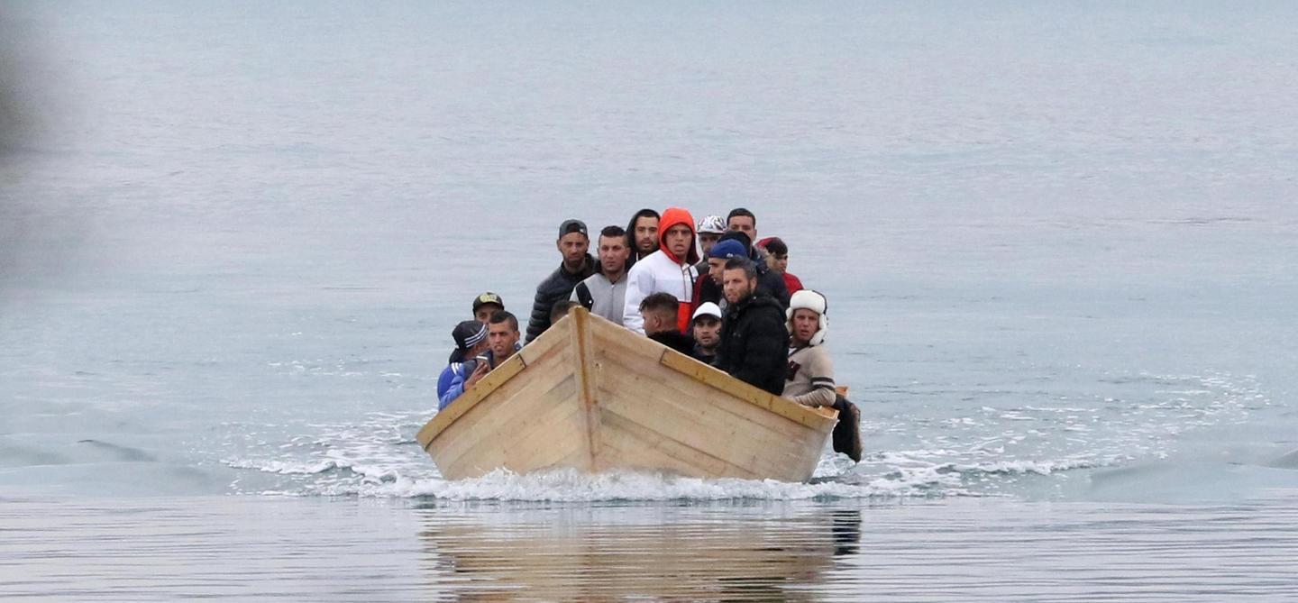 Arrivo di migranti in una foto d'archivio