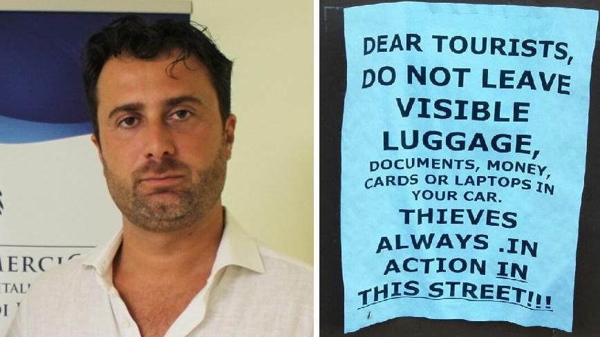 Da sinistra Alessandro Trolese di Confcommercio e l'avviso affisso in via Savi