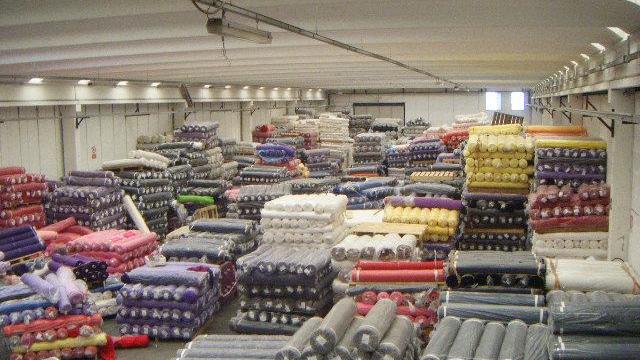 I tessuti sequestrati dalla guardia di finanza al Macrolotto di Prato