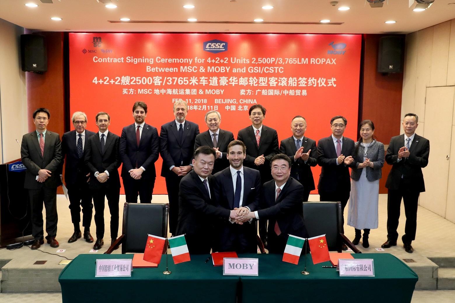 L'armatore Onorato durante la firma dell'accordo in Cina